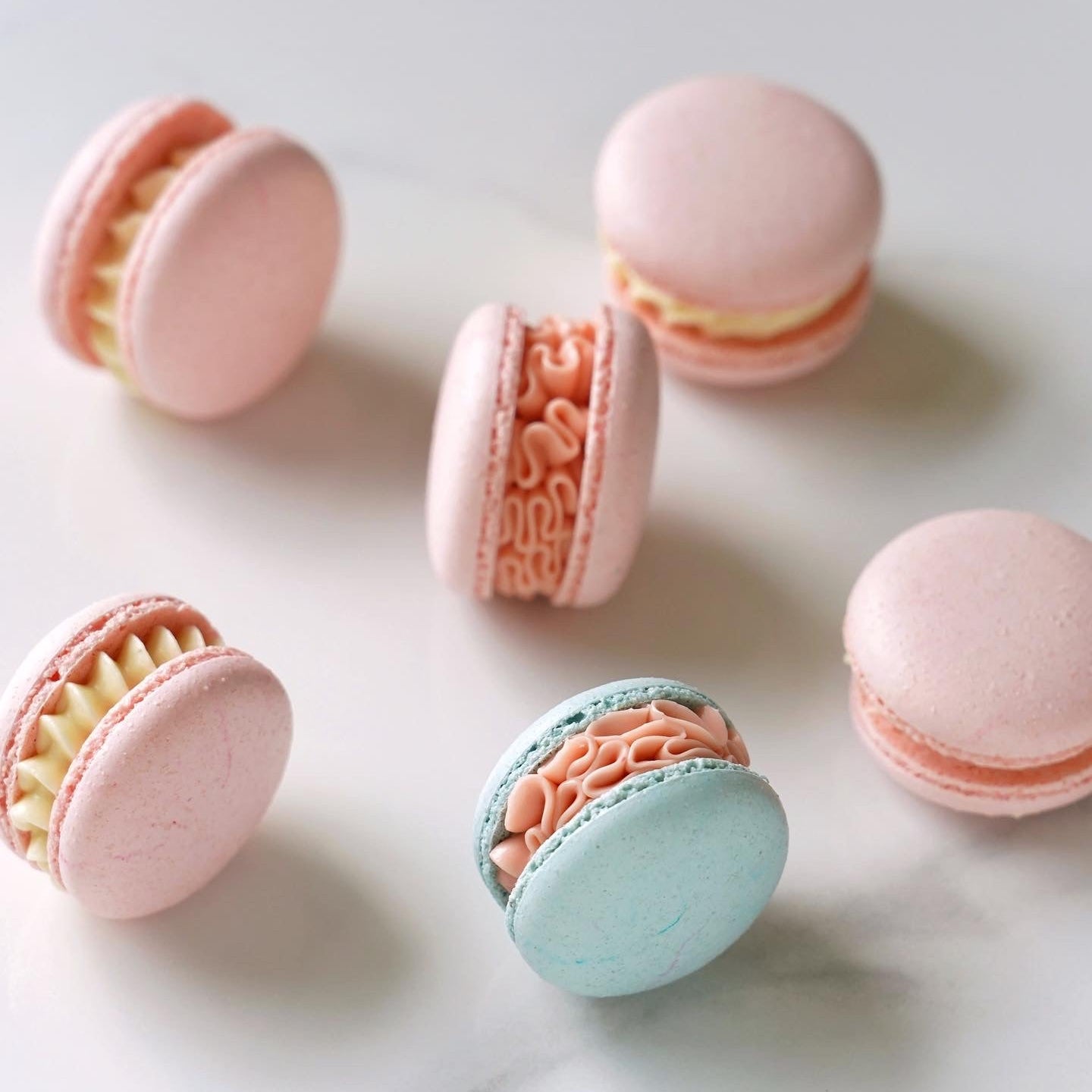 Pastel pink and blue macarons